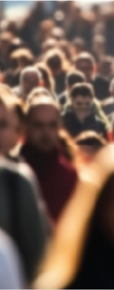 Crowd of people in soft focus representing perspective on people at scale